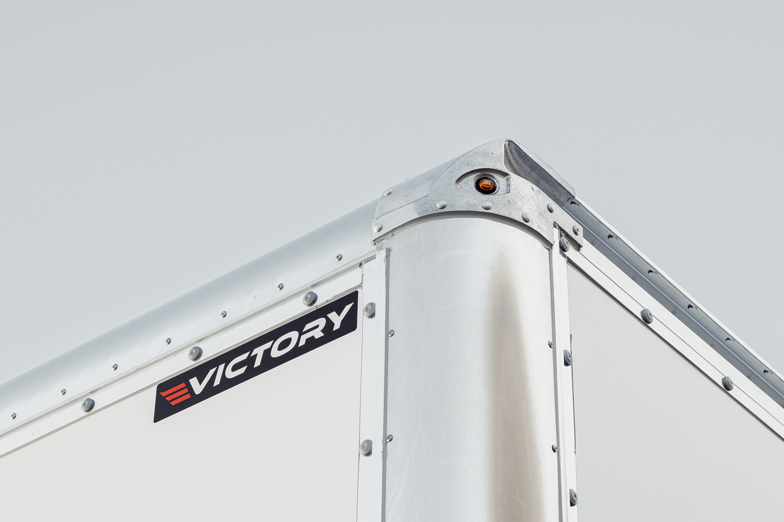Close-up of the corner of a Victory truck body.