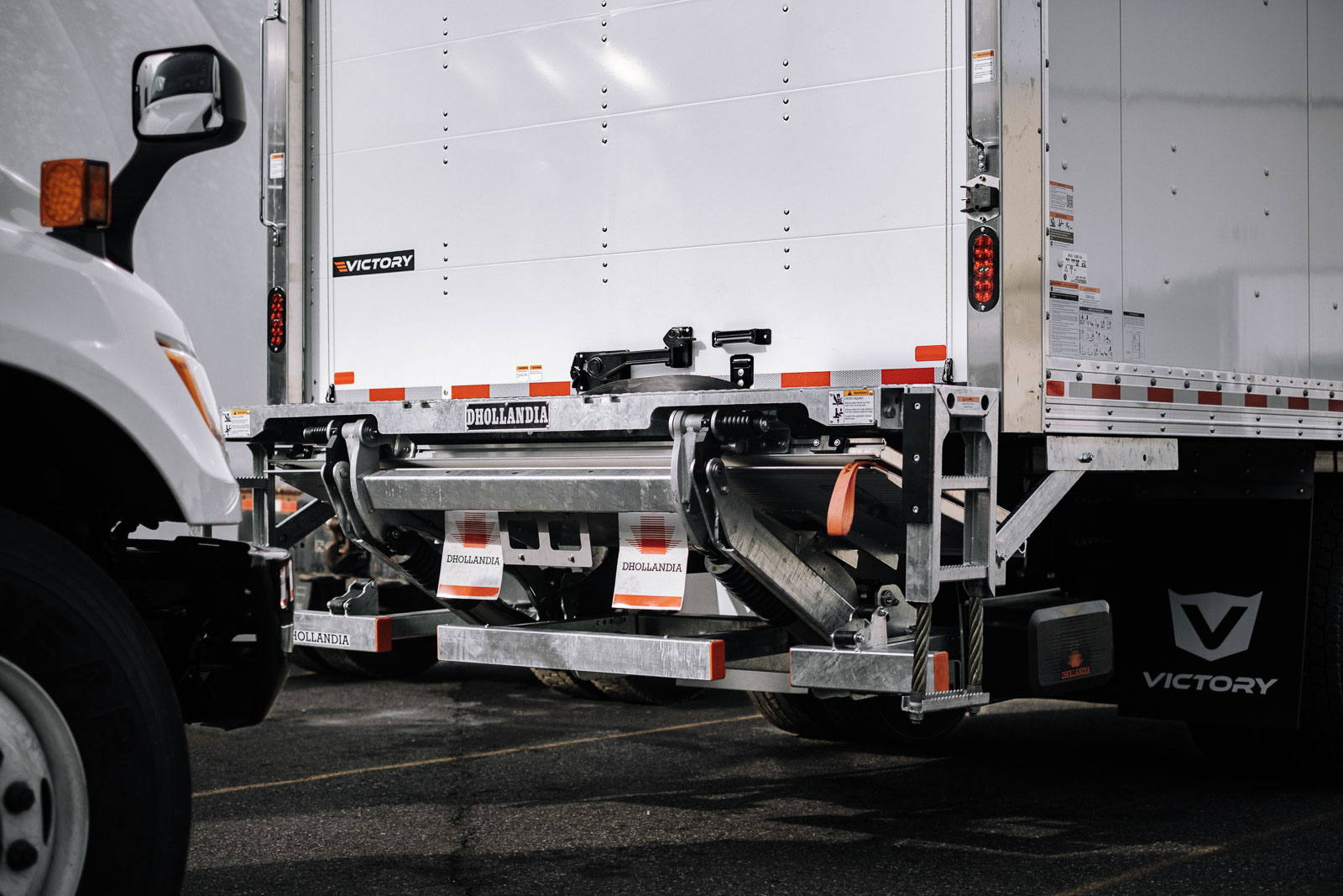 Closeup of a Dhollandia liftgate on a Victory truck body.