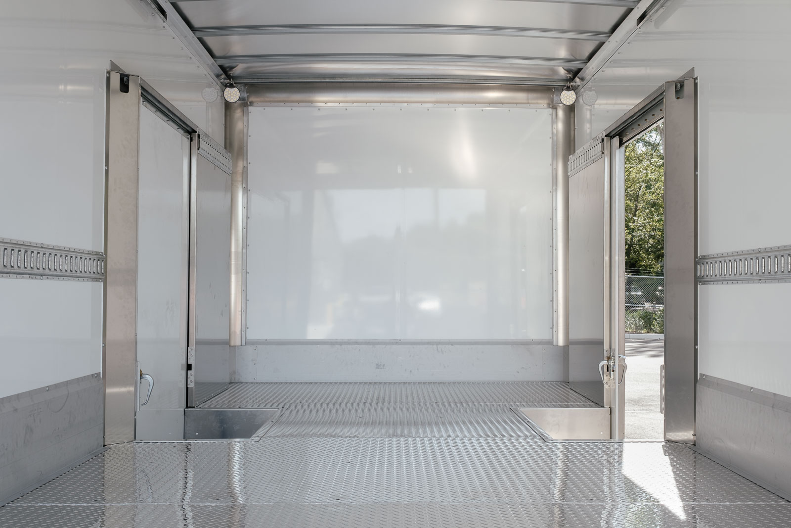 Doors on either side of the body allow access to the inside of the body.