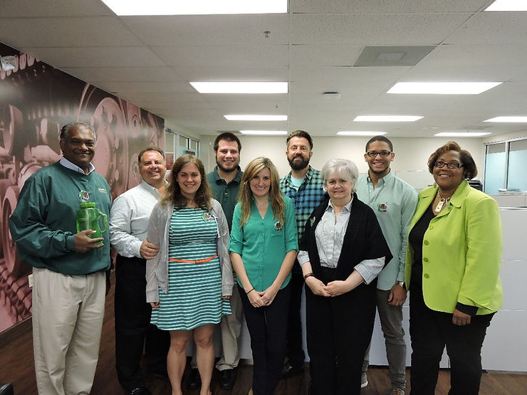 Group photo of Parts Life, Inc. team members wearing green in support of Team Isaiah on World Cerebral Palsy Awareness Day.