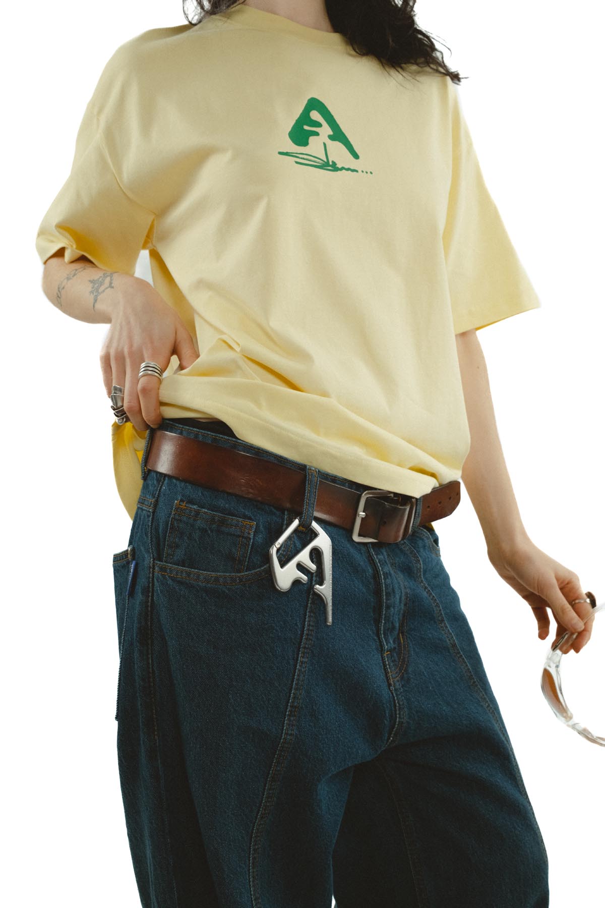 Model wearing Slawn Logo Lock Tee with Artifaxing Carabiner