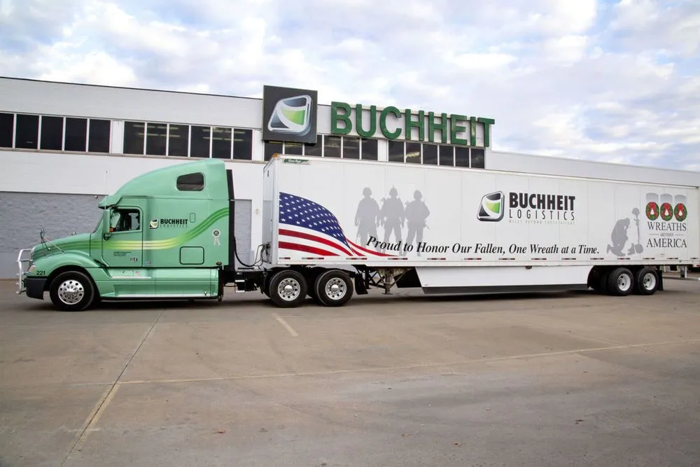 Green Buchheit Logistics semi-truck with Wreaths Across America trailer