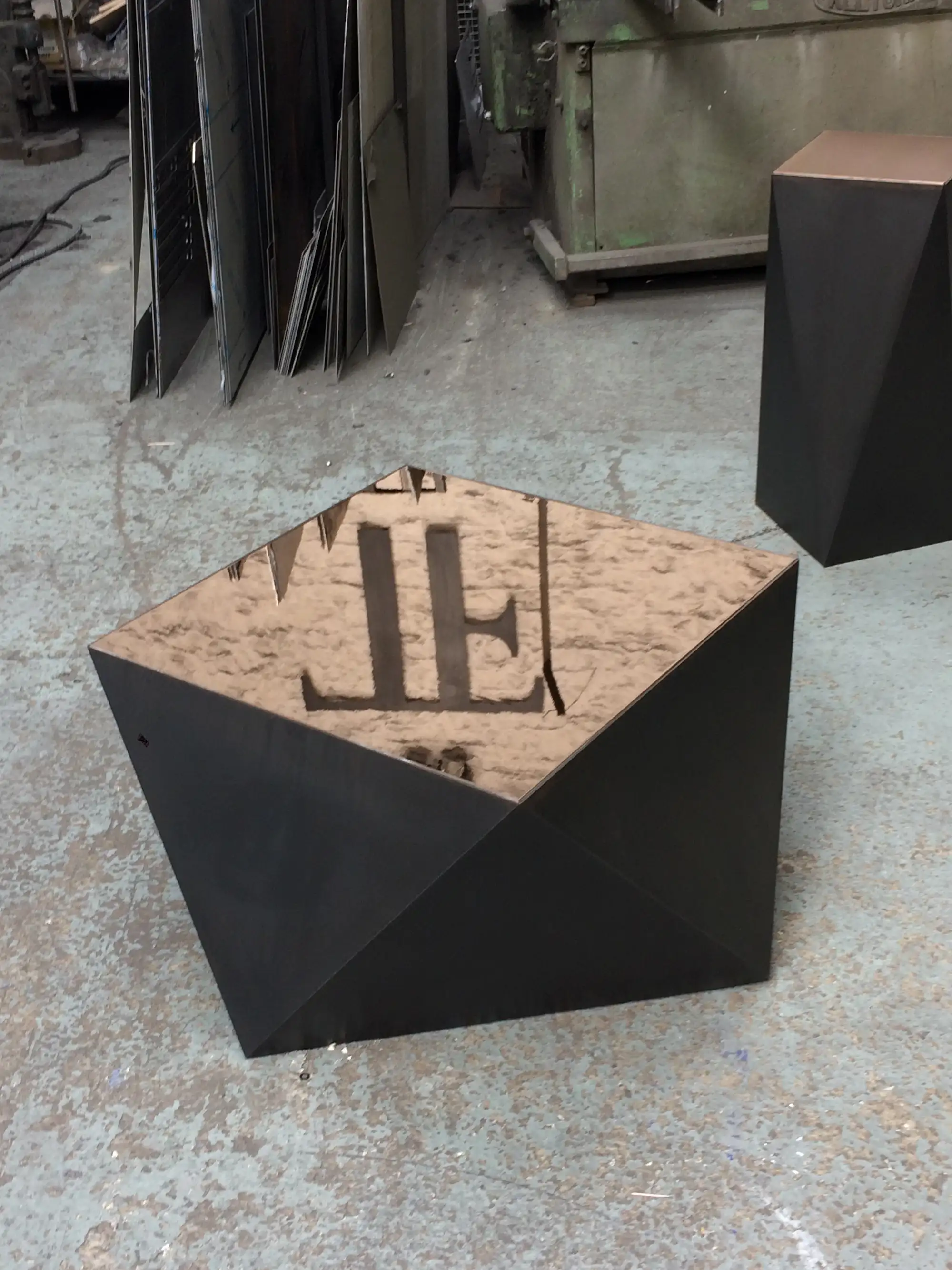 A faceted Tom Faulkner piece mid-fabrication in the Wiltshire workshop
