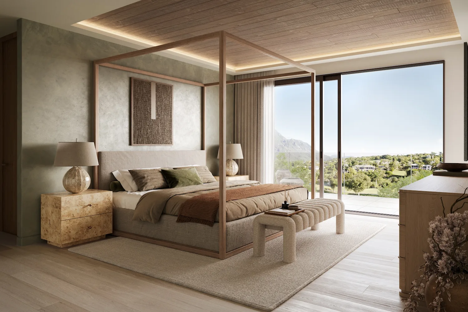 Primary bedroom with four-poster canopy bed and mountain views at Four Seasons Nevis Peak Residences