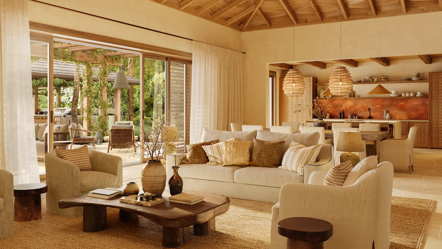 Open-plan living and dining area with rattan armchairs and a woven-pendant kitchen beyond at Nobu Residence, Barbuda