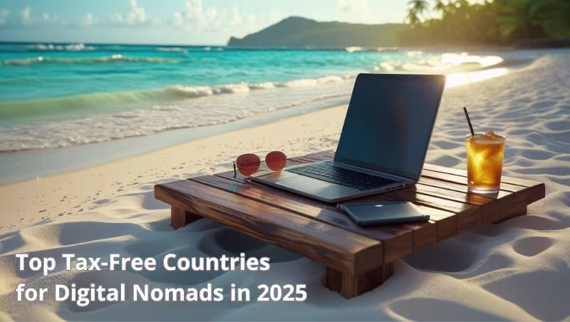 Laptop, sunglasses, and iced drink on a beach setup with ocean view – representing remote work lifestyle in top tax-free countries for digital nomads in 2025.