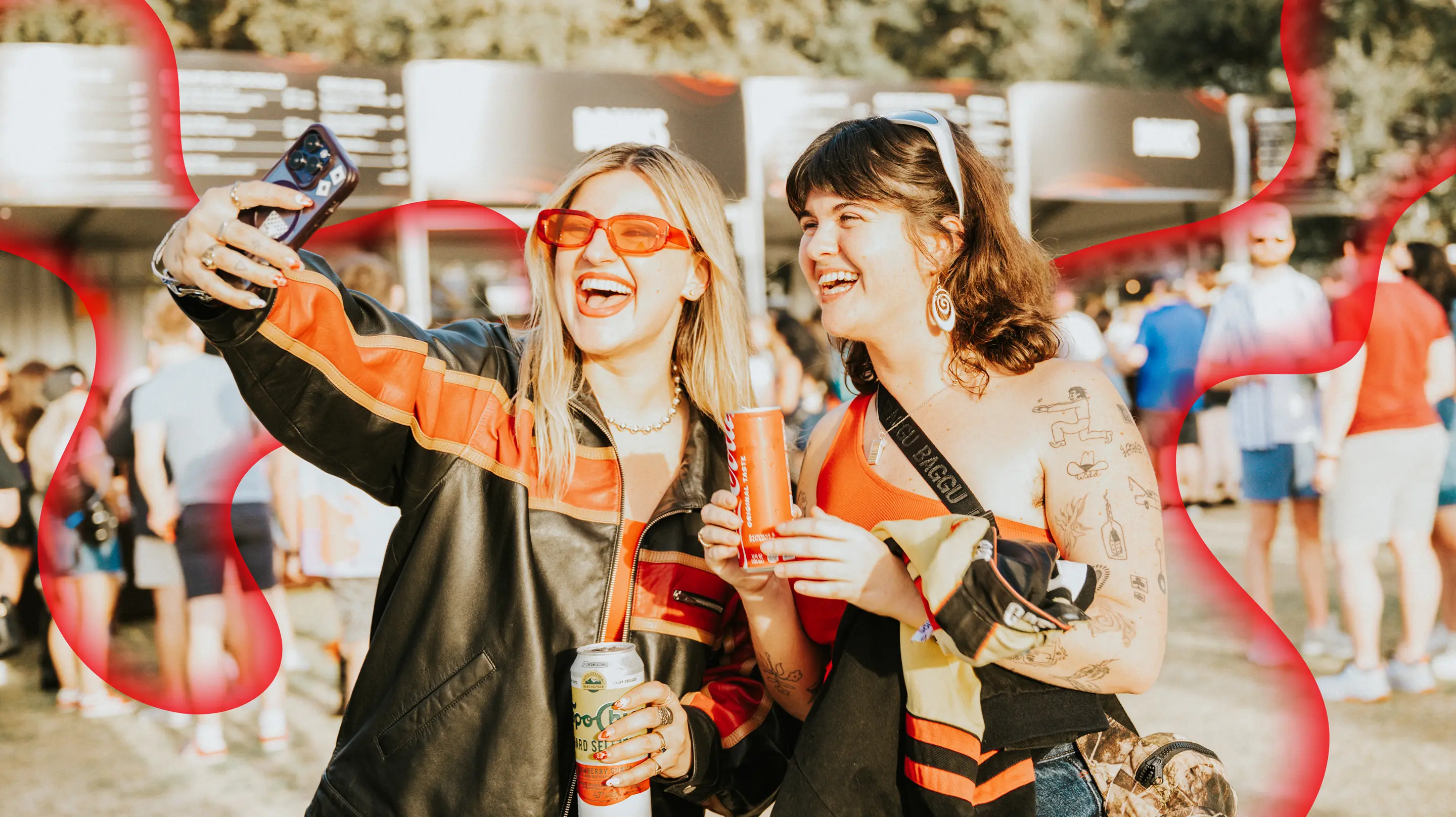 Two people taking a selfie at festival