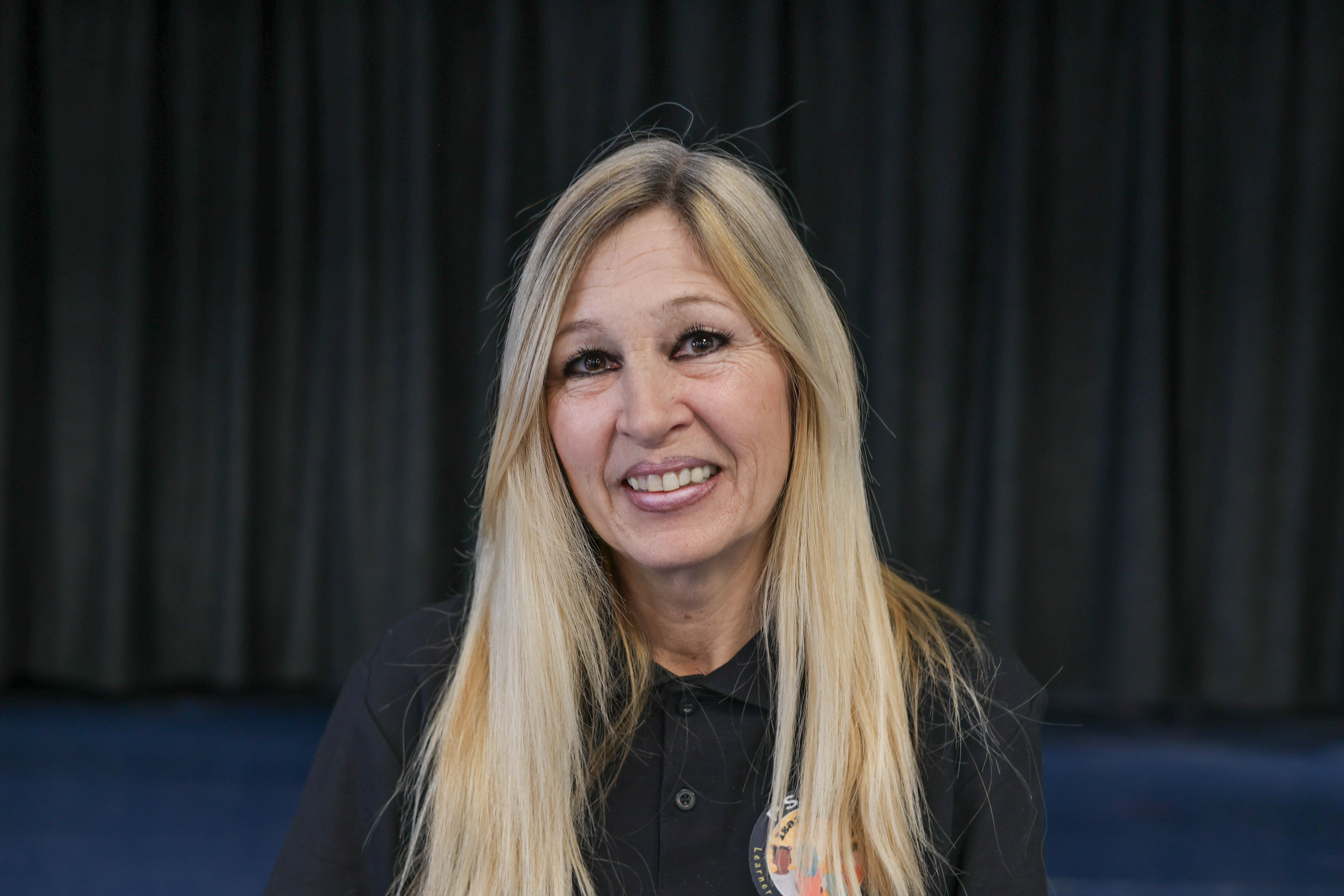 Violetta Botfeld smiling in school staff directory photo