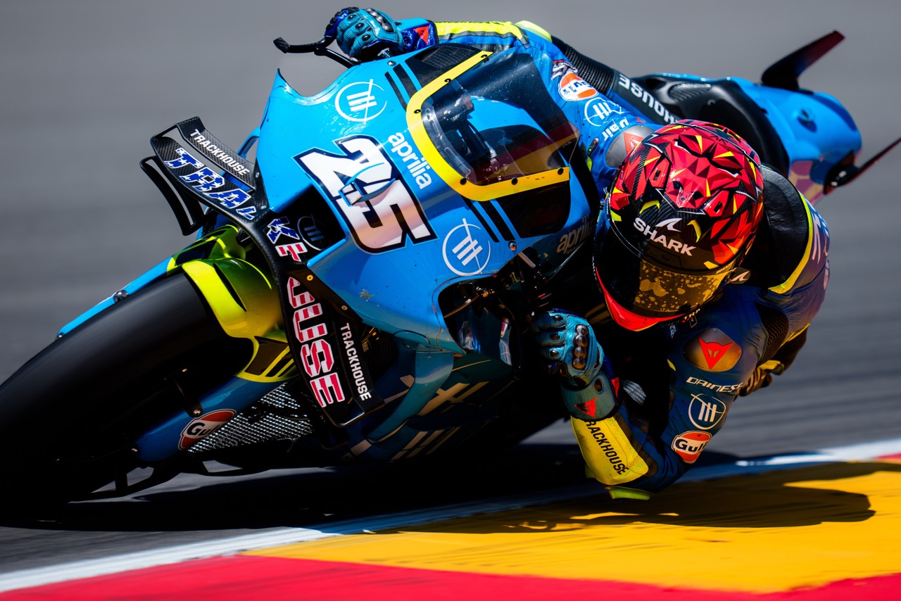 Raul Fernandez racing on a MotoGP bike on the finish line