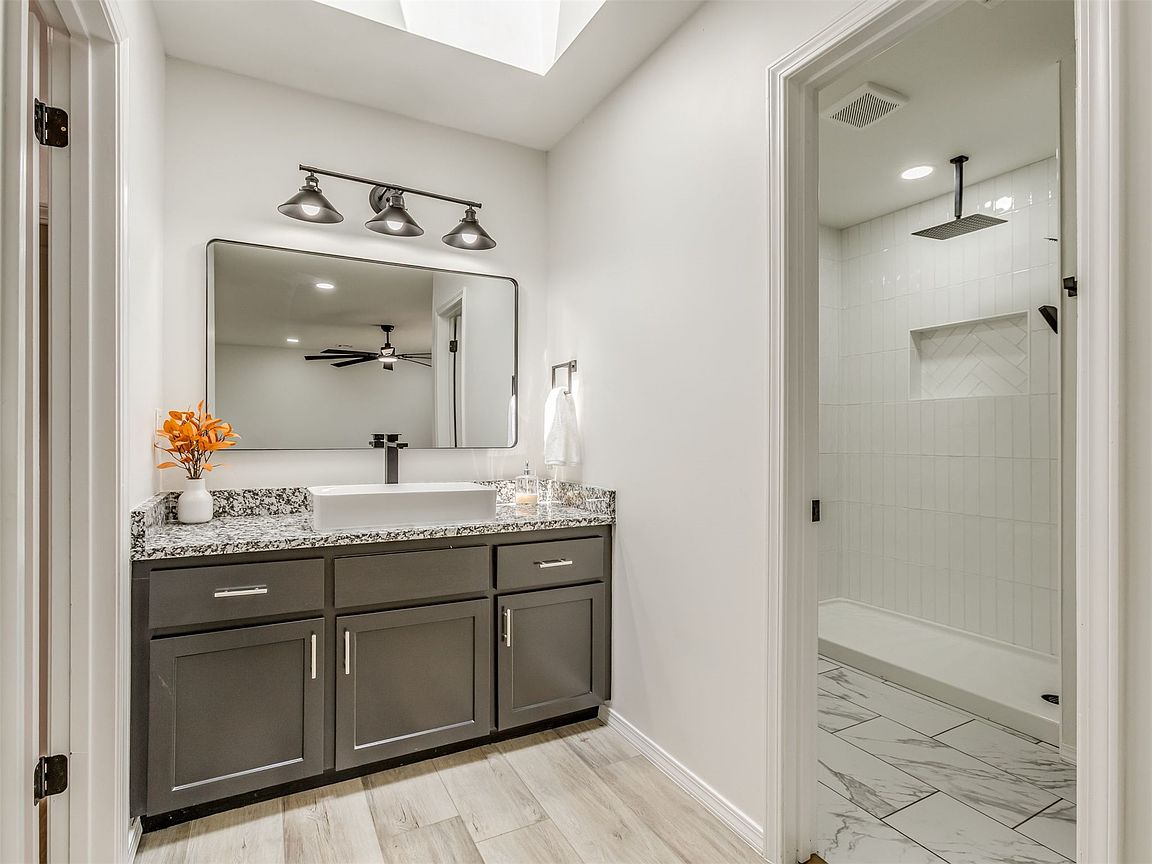 Updated bathroom vanity and walk-in shower