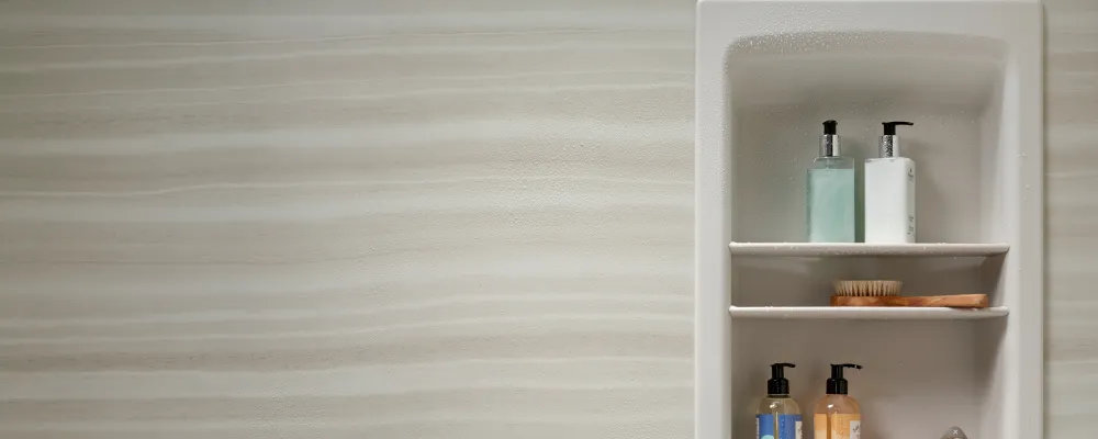A close-up of a gooseneck shower arm, showcasing its elegant curve and sturdy construction.