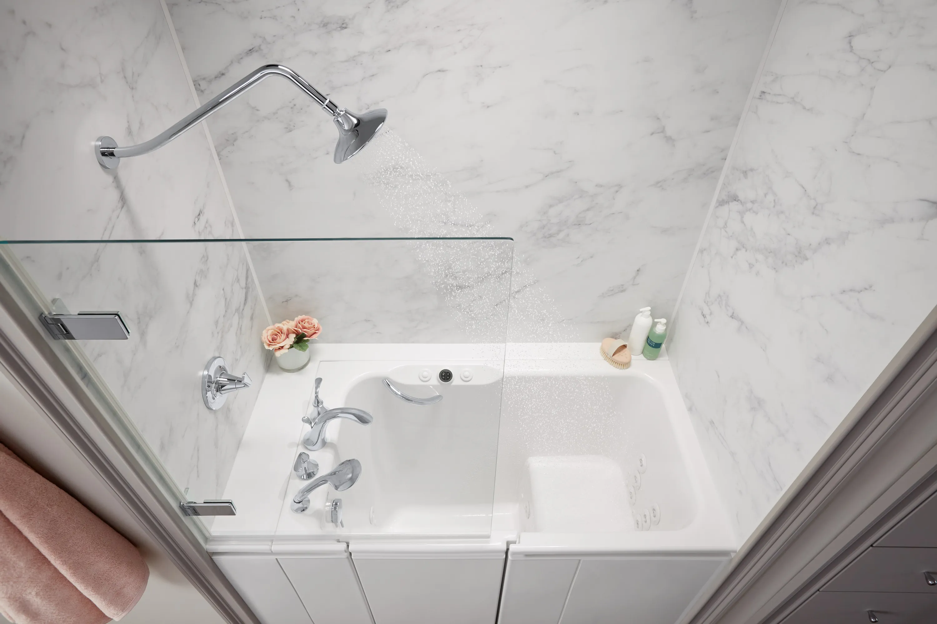 A bathroom remodel featuring a Kohler walk-in bath replacing an old standard tub.