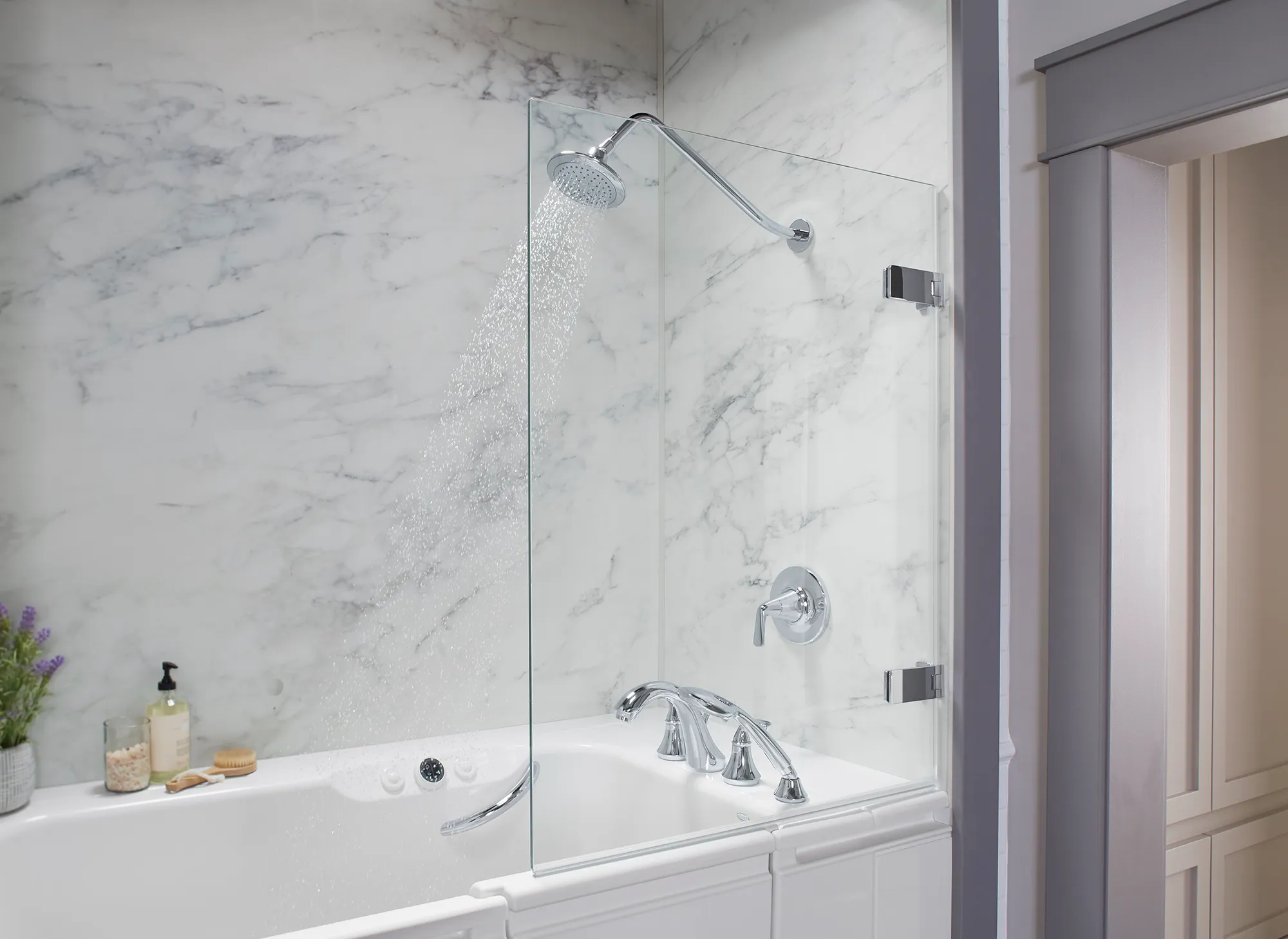 A small bathroom remodel featuring a space-saving Kohler walk-in bath for comfort and convenience.