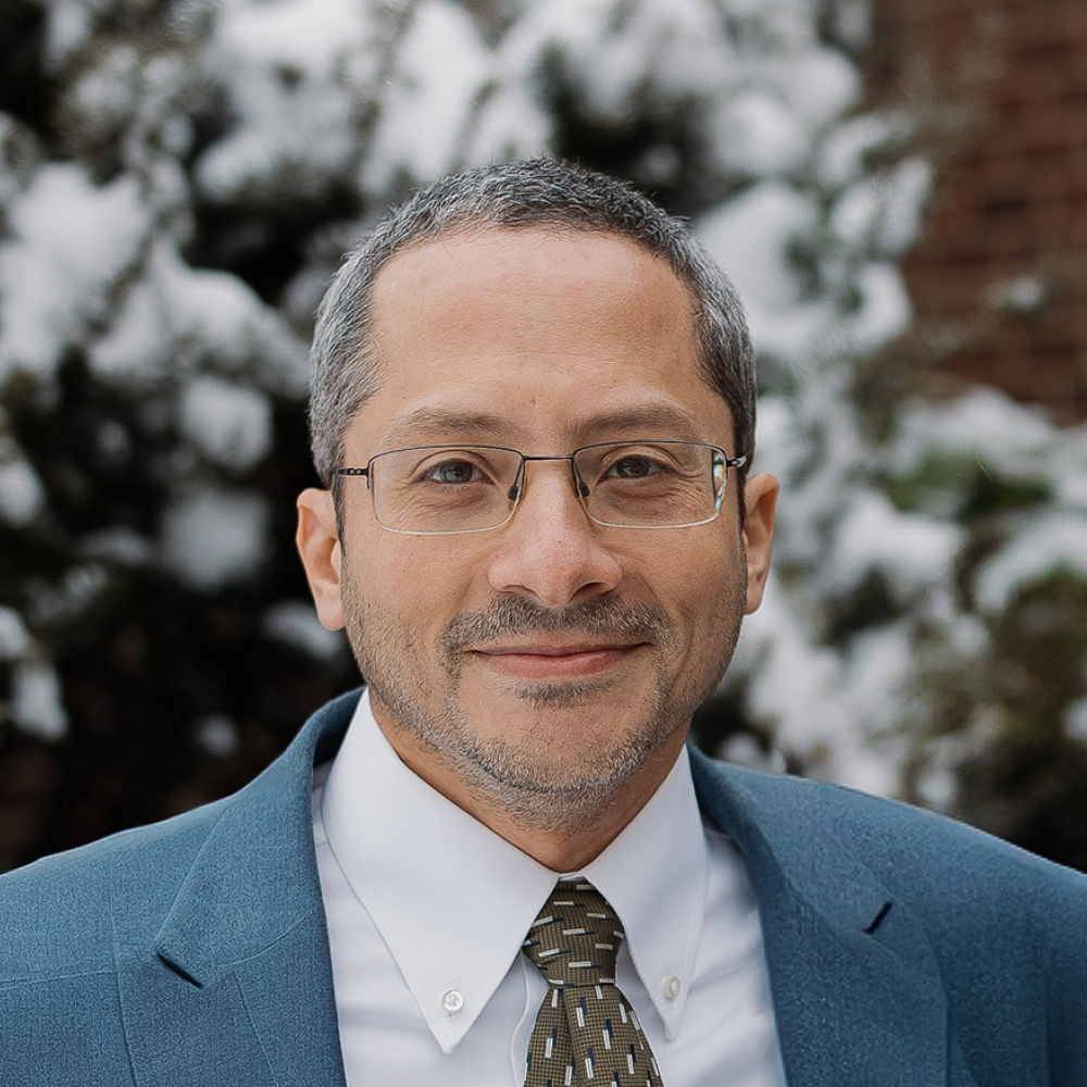 Lay Elder Ivan Candelier headshot in front of North Shore Baptist Church in Bayside, NY