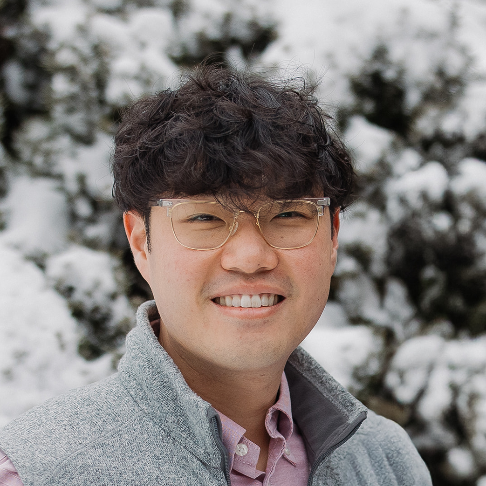 Staff member Dan Suh headshot in front of North Shore Baptist Church in Bayside, NY