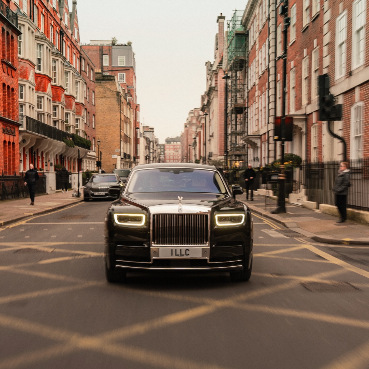 Professional chauffeur opening car door for business executive in corporate environment.