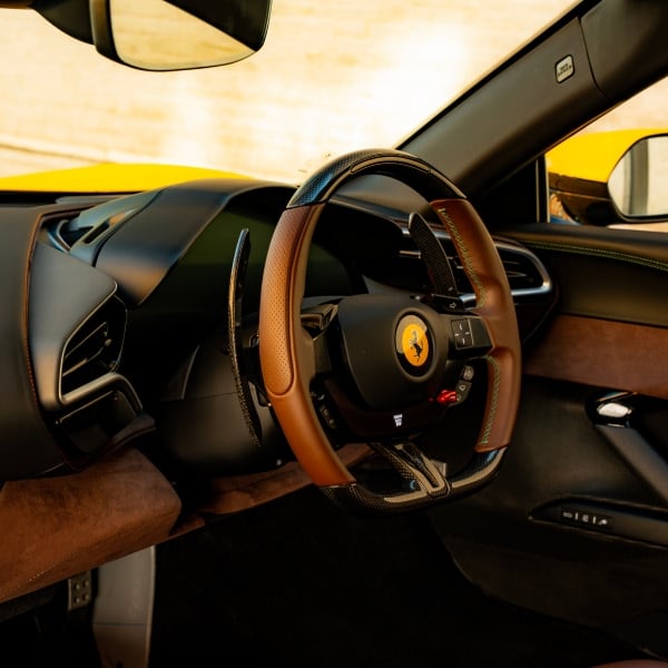 Yellow Ferrari 296 GTB — Iconic supercar available for rental in the UK