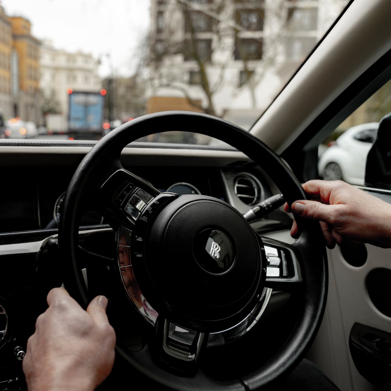 Executive corporate travel with professional chauffeur service.