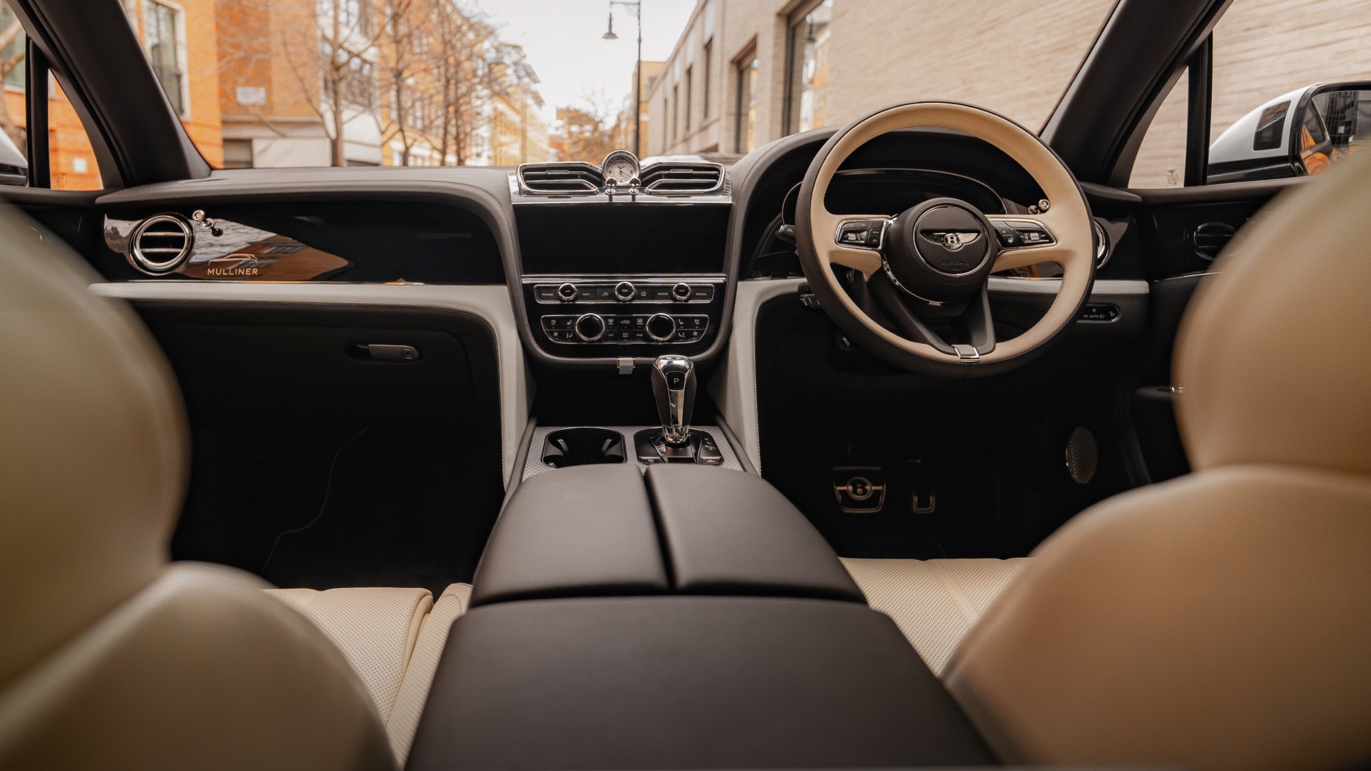 Bentley Bentayga interior with premium materials and chauffeur-driven comfort