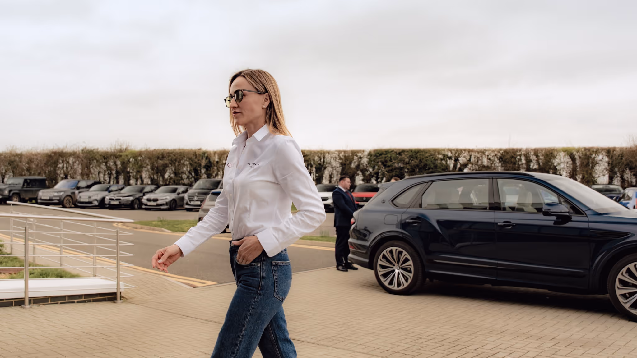 Professional chauffeur service client arriving at luxury London event in Bentley Bentayga — LLC London Luxury Chauffeuring