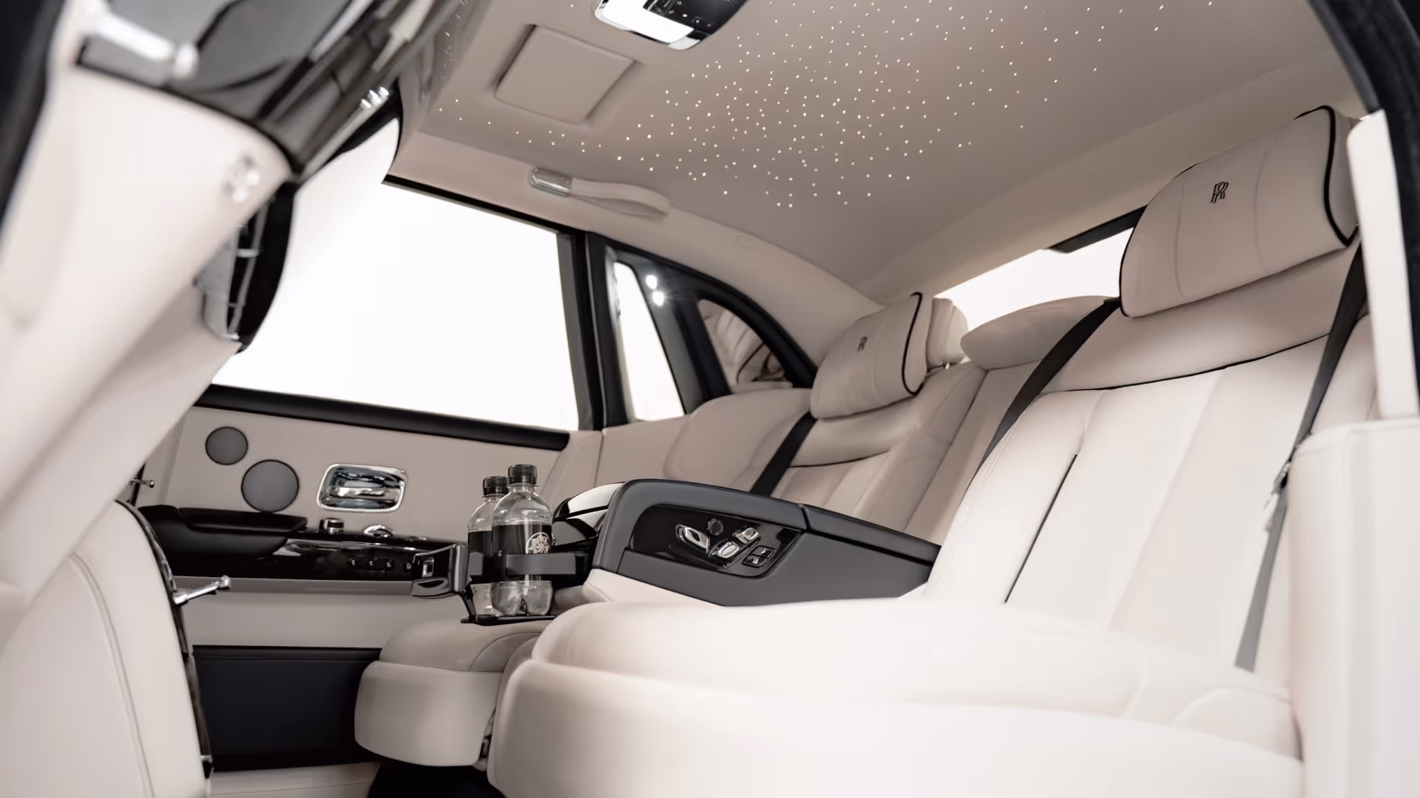 Rolls-Royce Phantom interior with starlight headliner and white leather cabin — LLC luxury wedding car hire London