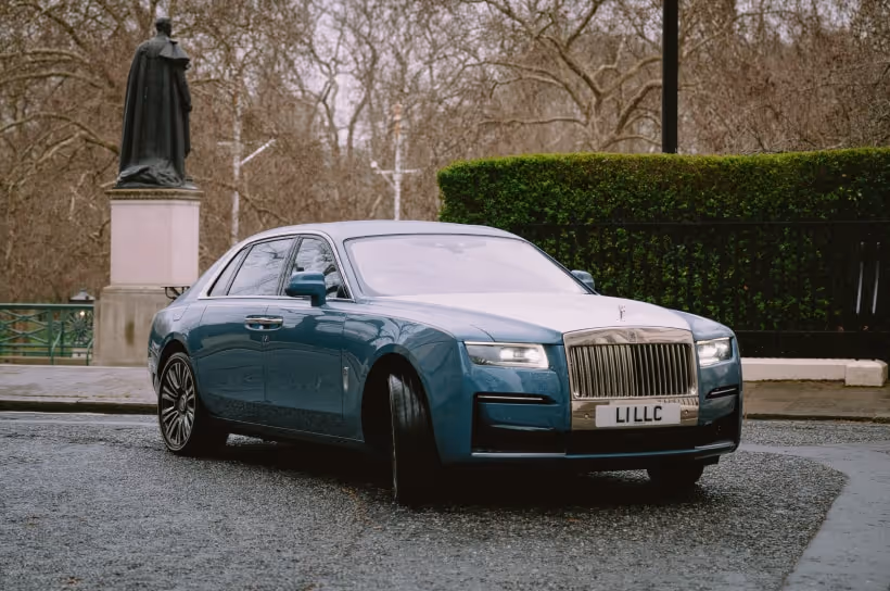 Rolls-Royce Ghost in blue driving through Mayfair London — LLC wedding car chauffeur service