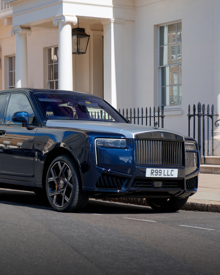 Rolls-Royce Cullinan parked outside a classic London residence, showcasing its luxury SUV presence for chauffeur-driven travel.