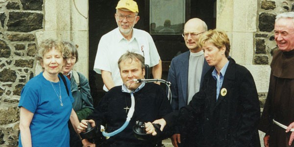 Steven and Patti Ann McDonald, Father Mychal Judge, and Pastor Johann Christoph Arnold in Northern Ireland.