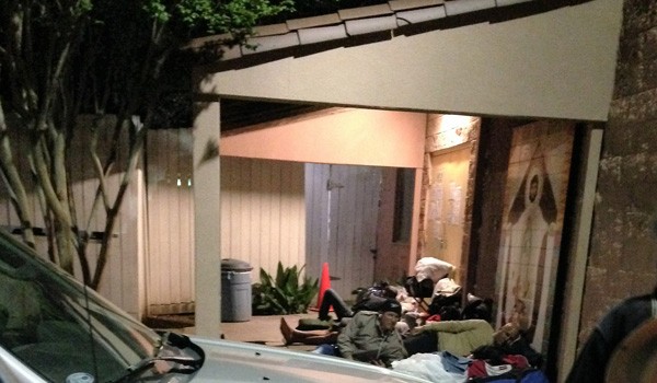 Refugees camping outside the Casa Juan Diego clinic, awaiting space in the guest houses
