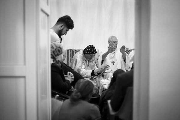 Father Jacques Mourad and Monsignor Paolo Bizzeti celebrate Mass for Iraqi ­Christian refugees. The majority of the thirty-four Christians of Nevşehir came to worship in this tiny drawing room.