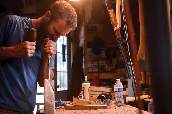 I am chiseling a socket for a butterfly joint on the edge of a walnut table.