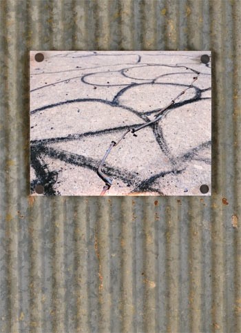 Drawing made on a concrete slab with materials found around the Ranch, 2017