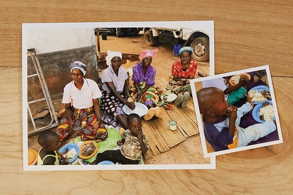 two photos on a wooden table of women and children in Nigeria eating together