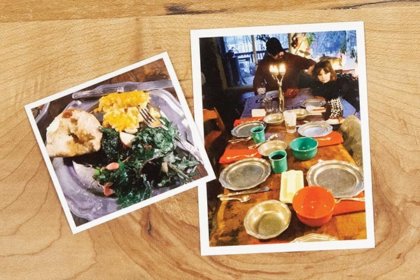 two photos on a wooden table, one of a table set with dishes and candles and the other of dishes of food