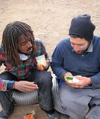 Melake and Eyal share Ethiopian Lent food.