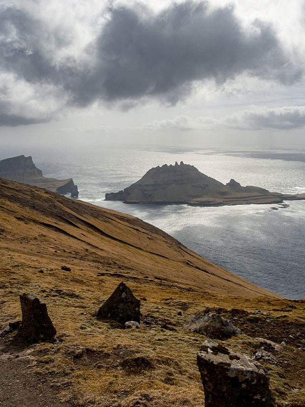 rocky coastline under a stormy sky