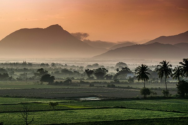 sunrise over valley in India