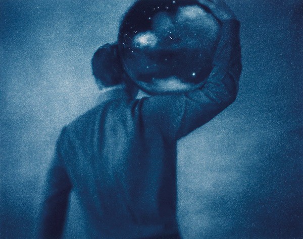 painting of a man carrying the earth