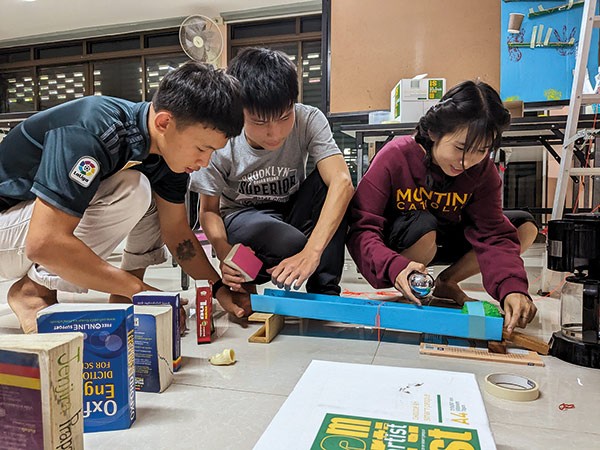 Young migrants from Myanmar work toward their GEDs.