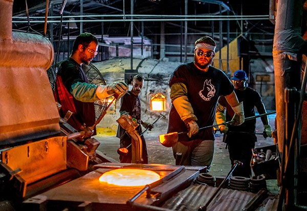 workers at a glass factory
