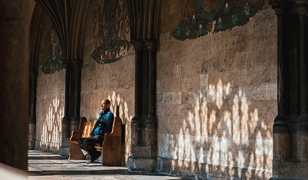 someone sitting on a bench