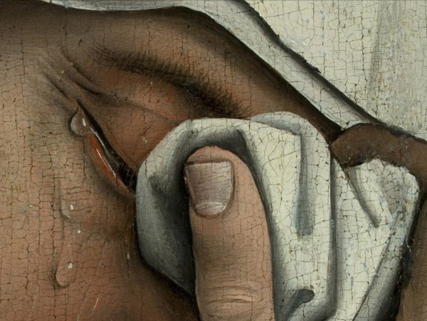 painting of a woman wiping away tears