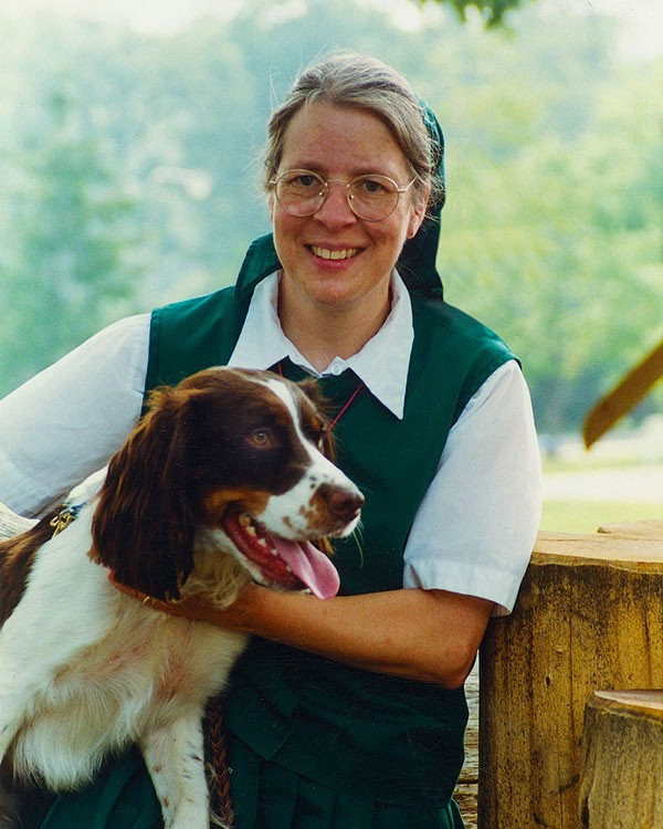 a woman and a dog