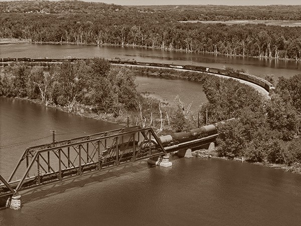 a train going over a trestle bridge