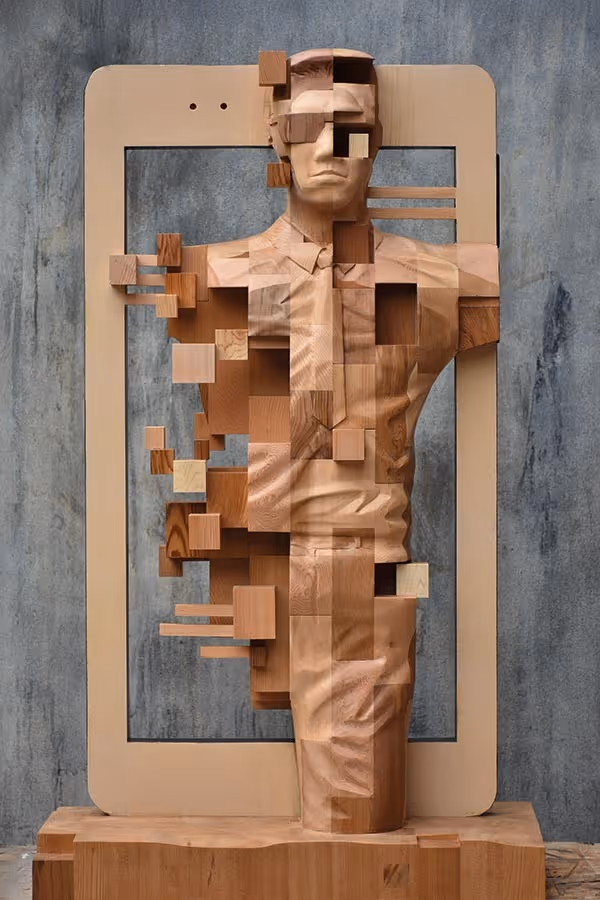 wood sculpture of a man