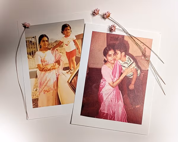 portraits of a boy standing by his mother