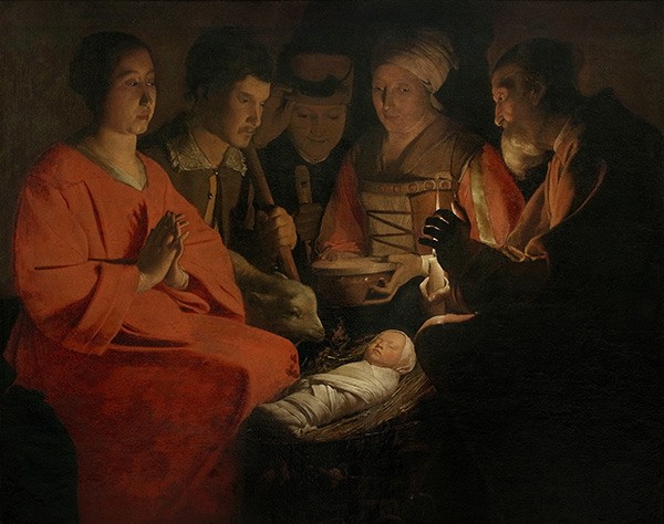 Shepherds adoring Jesus in a manger