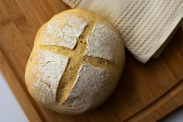 a loaf of bread on a cutting board
