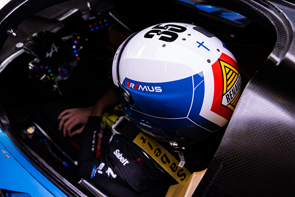 car racer seated in his car