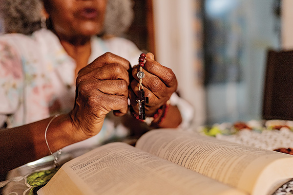 hands with rosary